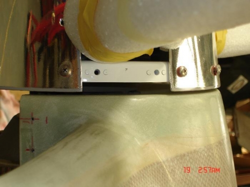 The manual says you should fit the cowl slightly low to allow for future engine sag