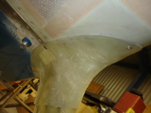 Tapped the belly one through the flange and hinge