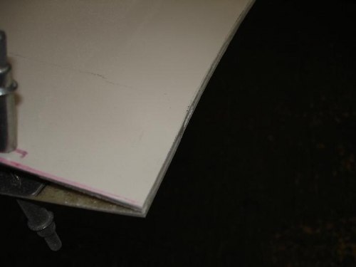 I used an air belt sander with a zirconian grit belt