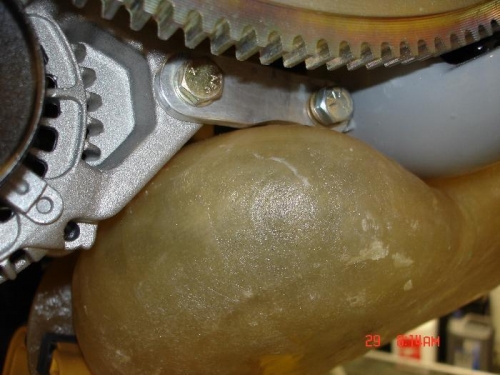 Its hard up against the alternator