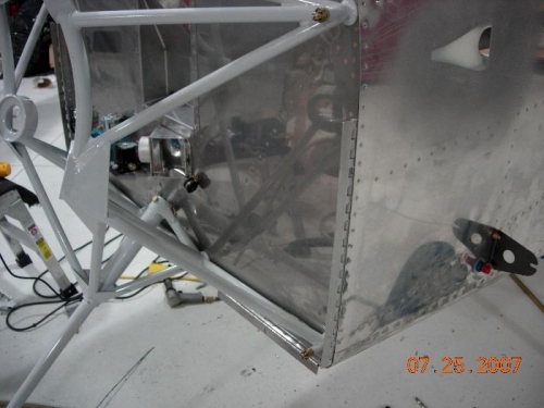 Left fairing hinge, motor mount