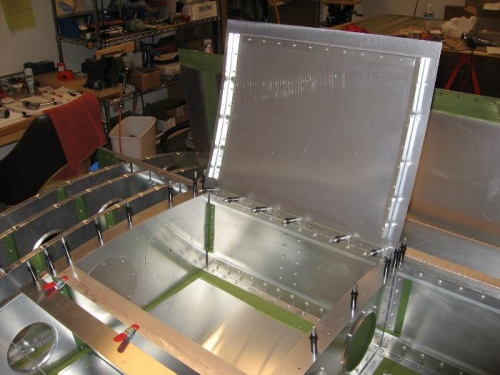 Shows side flanges for door to set on