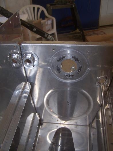 Strainer flange, nutplates and anti-rotation bracket clecoed on.