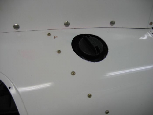 One of the fuel filler cutouts