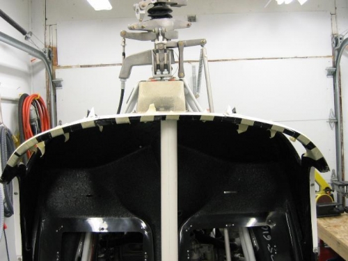 Headliner fitted to shell