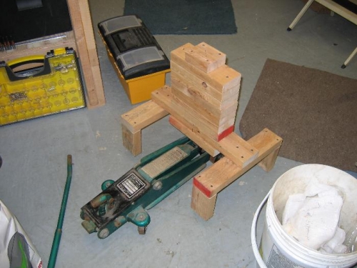 Jack with engine frame