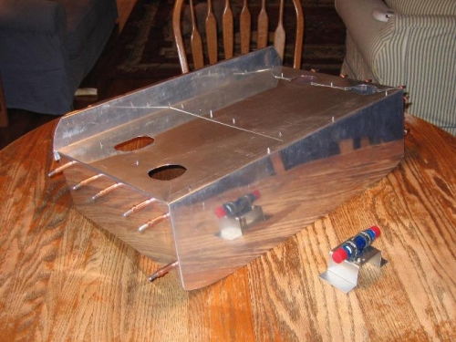 Heat shield clecoed and drain