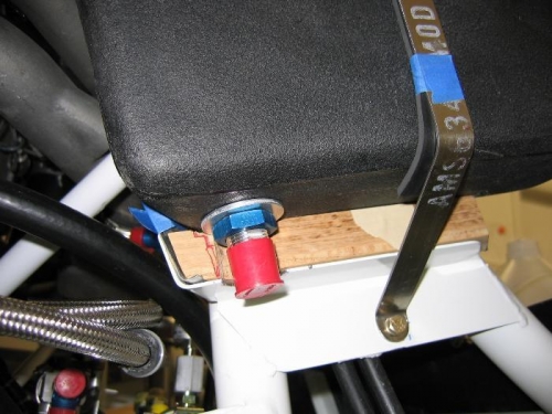 Copilot side tank spacer