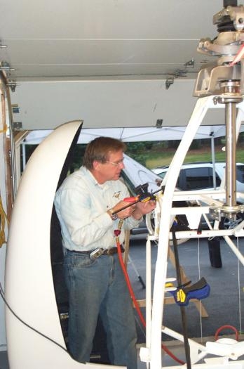 Drilling holes for tail boom.