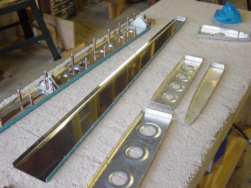 Hinges added, ribs fluted, straightened.