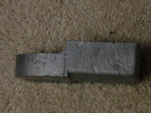 Trimmed right counterbalance weight.