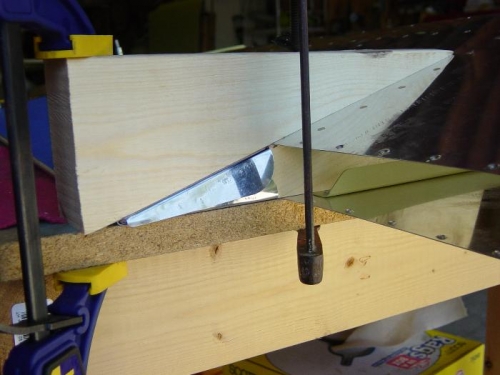 Bending inboard left elevator tabs