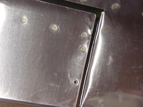 Repair of trim tab to increase clearance