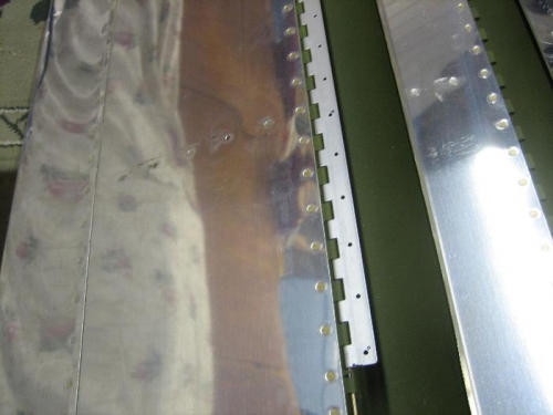 Rt Flap hinge drilled, ready for priming