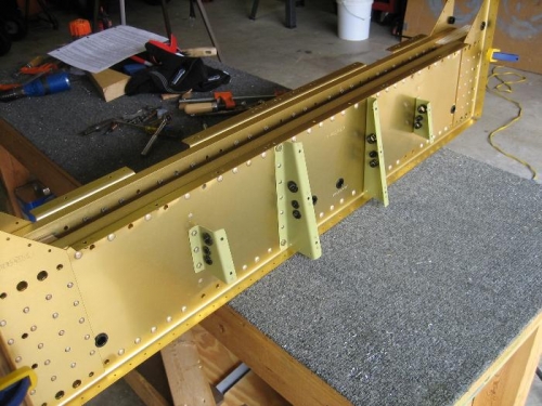 Riveted with brackets attached