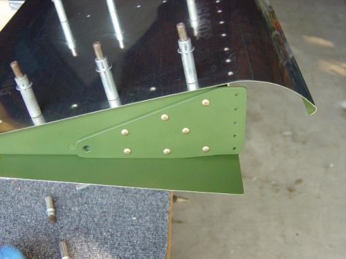 Stiffener plate with nutplare attached to the inside