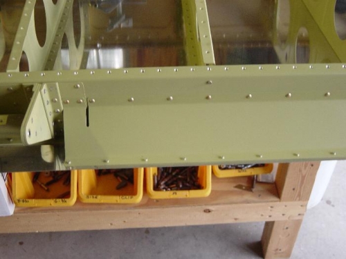 Aileron gap seal primed and installed to left wing