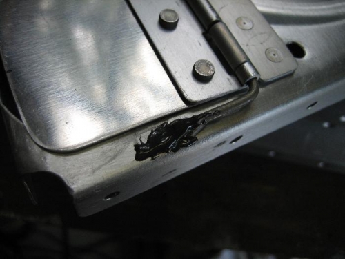 The #2 rib flapper door hinge pin prosealed in place