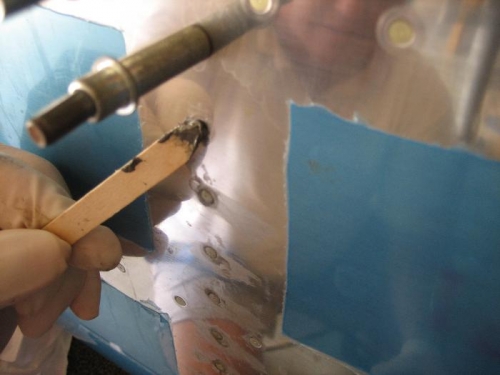 Dab of proseal to seal manufactured head