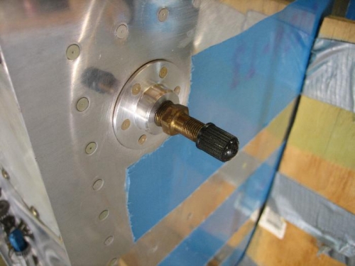 Van's schrader valve in drain hole.