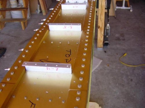 Z-brackets temporally attached to the spar