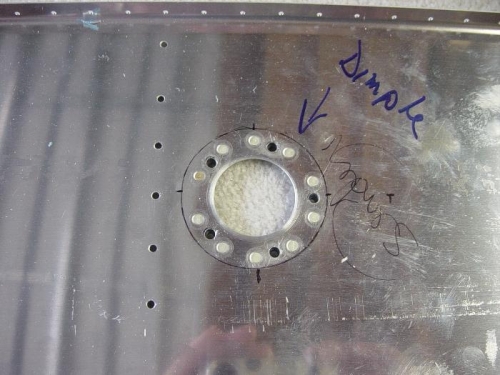 Fuel sender hole drilled and nutplates installed to baffle