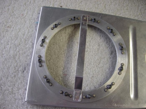 Cover plate attach ring and antihang bracket