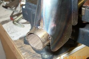After true and level tack weld flange to tube.