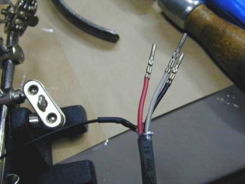 Shrink tubing over solder joint
