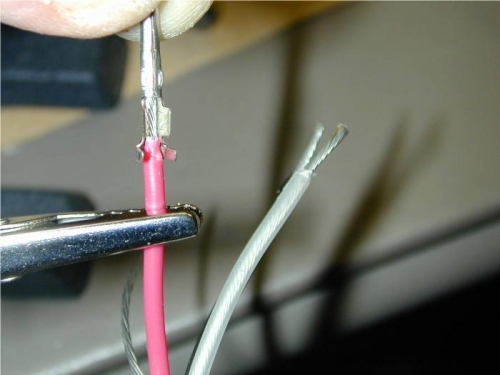 Pin held to wire