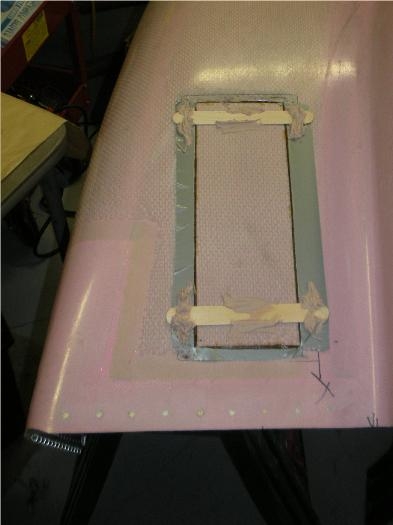 Original louver cutout section held in place with bondo & sticks