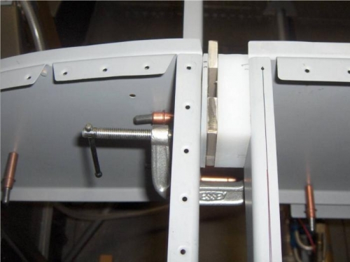 Canopy hinge components jigged in place