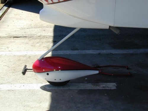 Mounted nose wheel pant for first flight