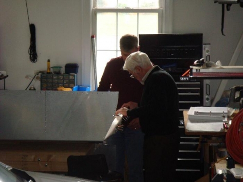 Dad inspecting my work.