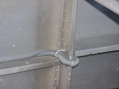 Strobe conduit around bulkhead