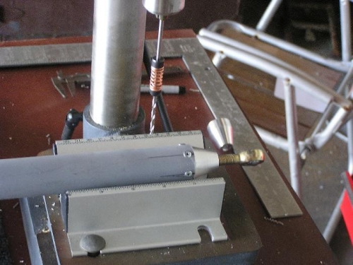 Push rod cut to length and end bearing riveted  in place