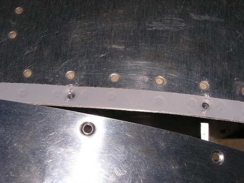Nut plates installed with doubler