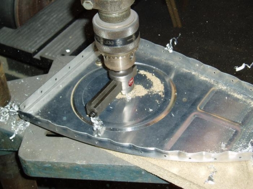 cutting the access hole with a fly cutter