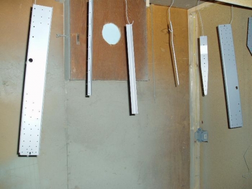 parts in paint booth for priming