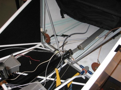 Various wires coming forward from rear of fuselage