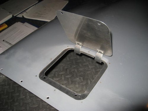 Door assembly installed with solid AN countersunk rivets