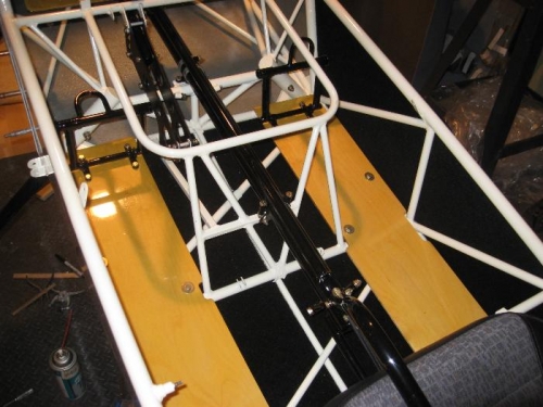 Aft floor boards and rear seat rudder/brake pedals