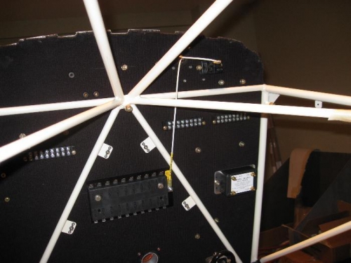 Fuse block center, voltage monitor to the right and relay upper right