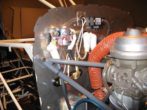 Battery and starter solenoids and ammeter shunt.