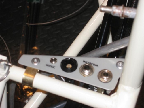 Pilot's jack pad.  From left to right, music plug, Bose headset plug, standard headset and microphone