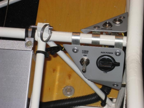 Co-pilots map light switch and auxillary power outlet