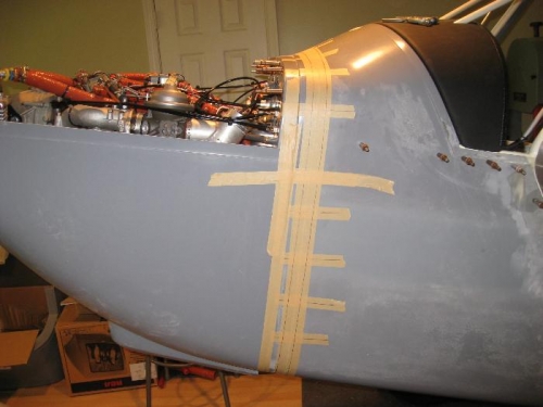 Bottom cowl taped in place.  Mount holes and trim lines are extended marked on boot cowl