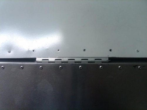 rivets removed to insert aileron for attach