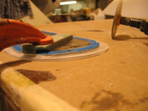 Window clamped to table for die grinding