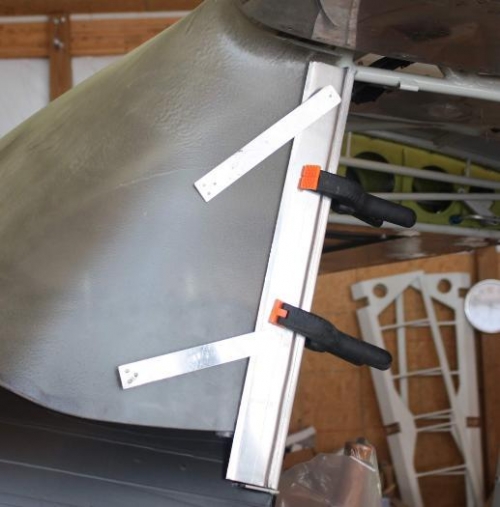 Drilling post holes.